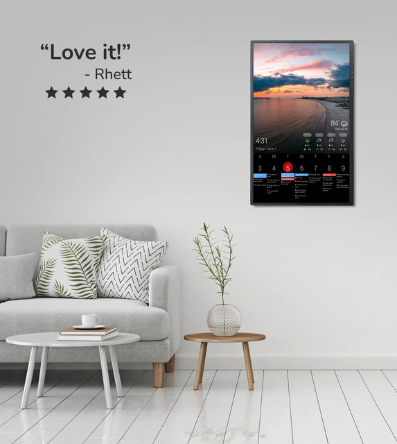 DAKboard wall display showing a customizable home dashboard.
